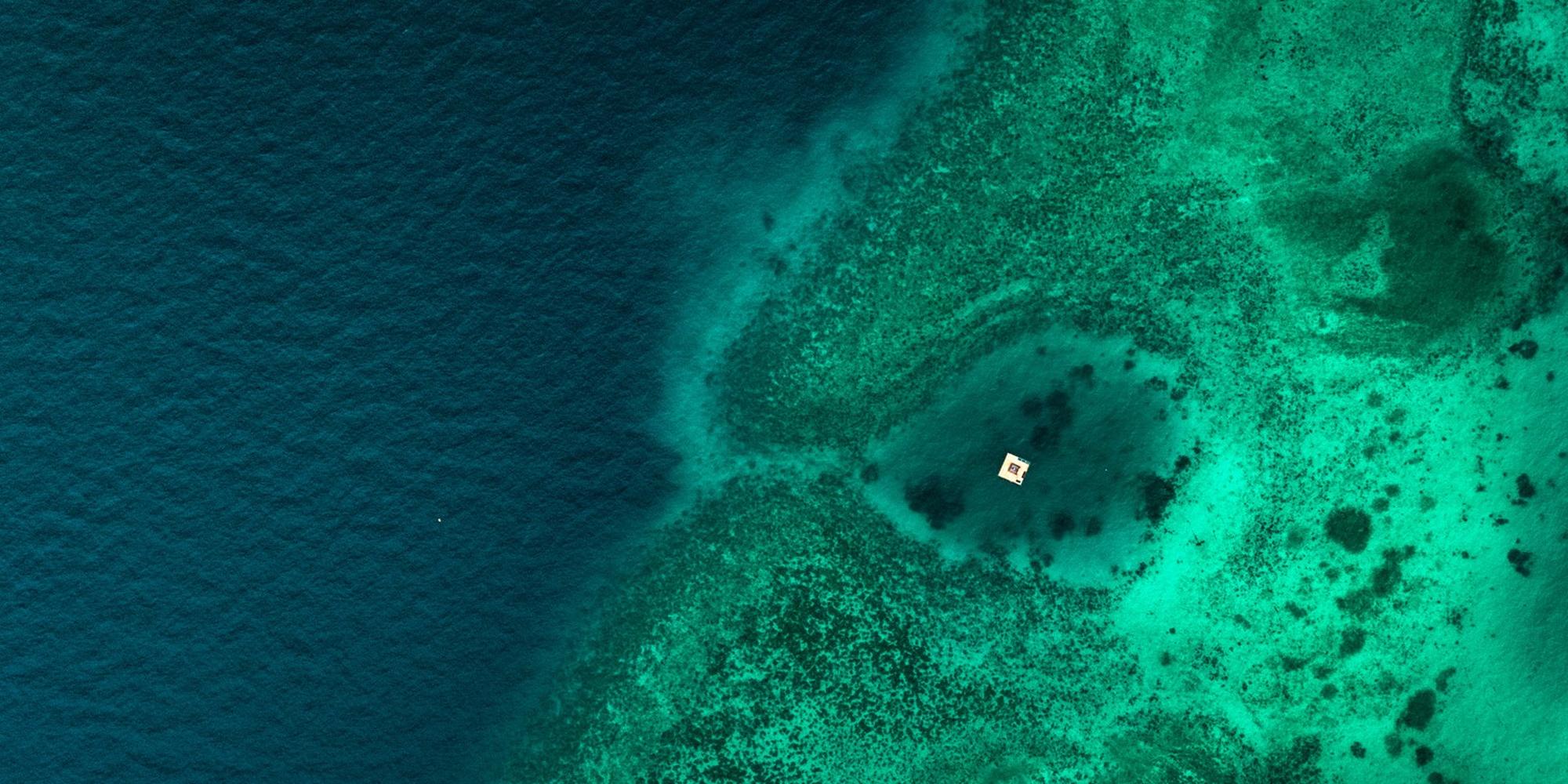 Overwater villa at the Manta Resort on Pemba Island with turquoise ocean views. Pemba Island Manta Resort Overwater Villa.