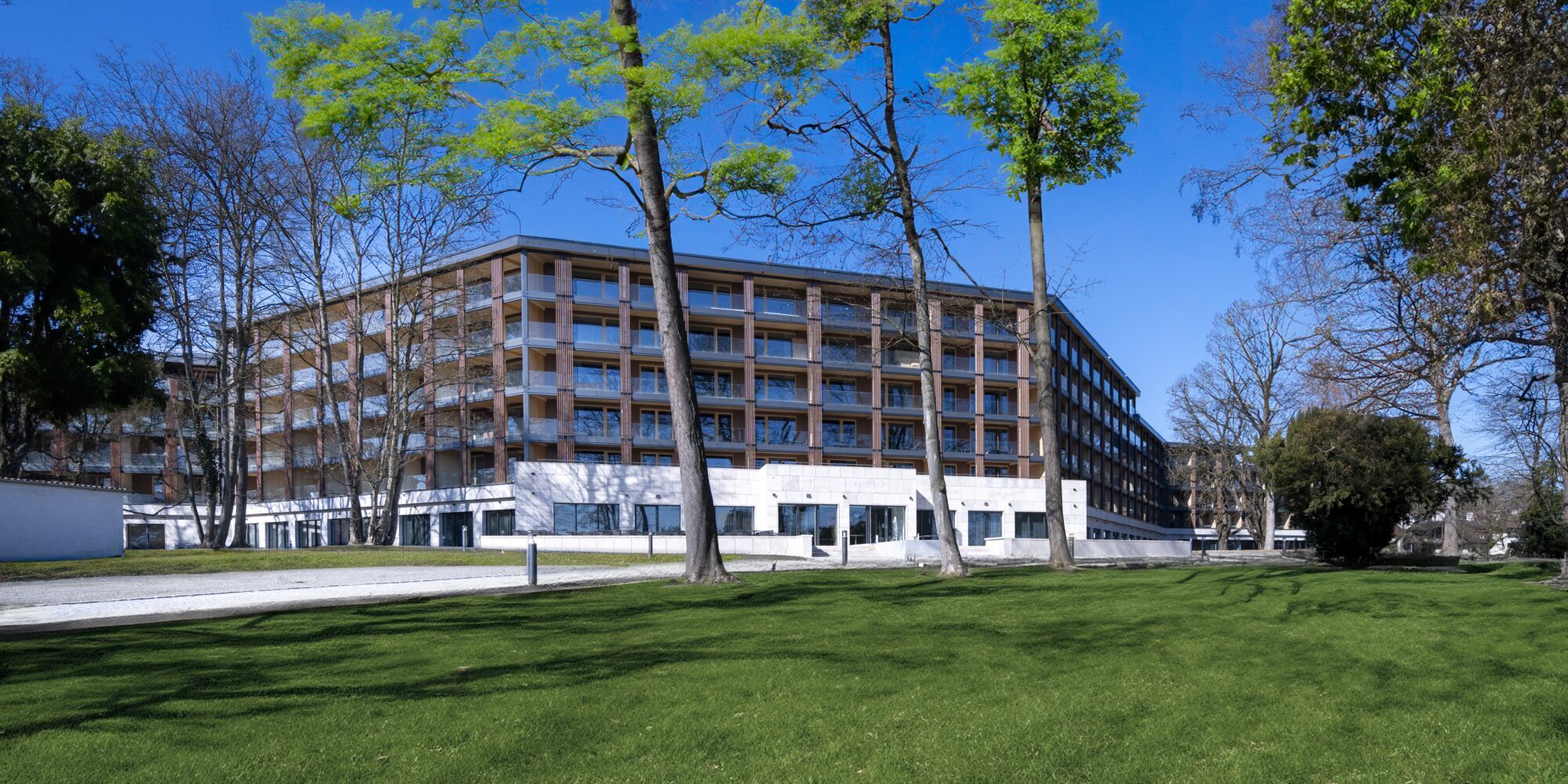 A modern multi-story building of Buff Medical Resort in Europe.