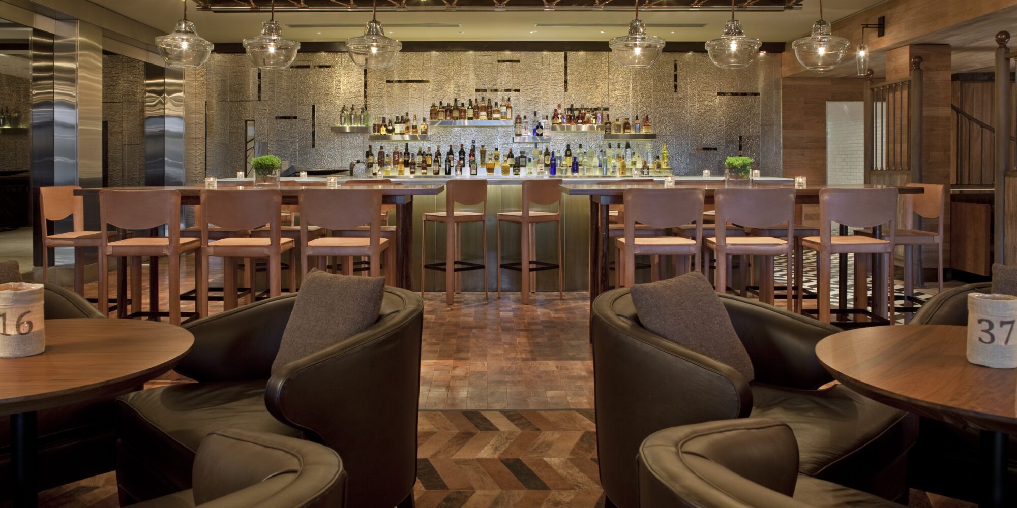 The bar area features high-backed grey armchairs Four Seasons Buenos Aires, Argentina. The bar area features high-backed grey armchairs Four Seasons Buenos Aires, Argentina.